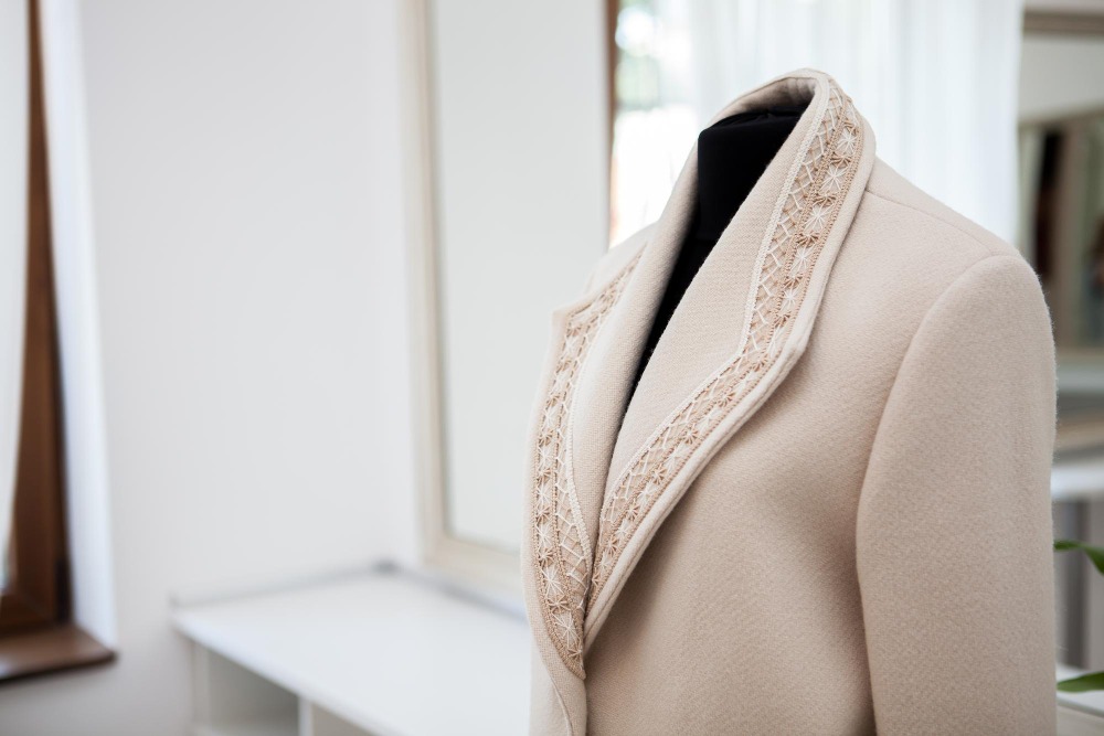 A collection of luxury garments being delicately cleaned and cared for at Fabspin's premium fabric care facility.